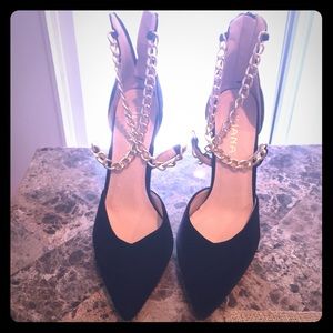 Black heels with gold chains. Gently used.